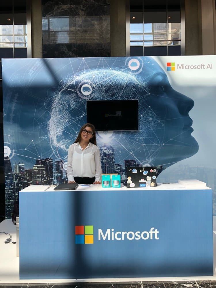 Ecem at a Microsoft AI booth