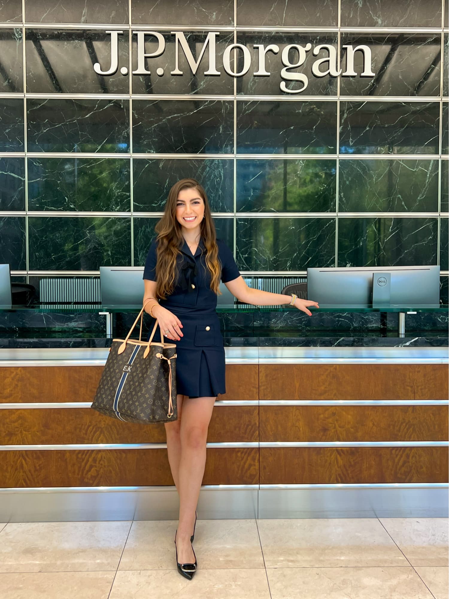 Ecem beneath the J.P. Morgan sign in London